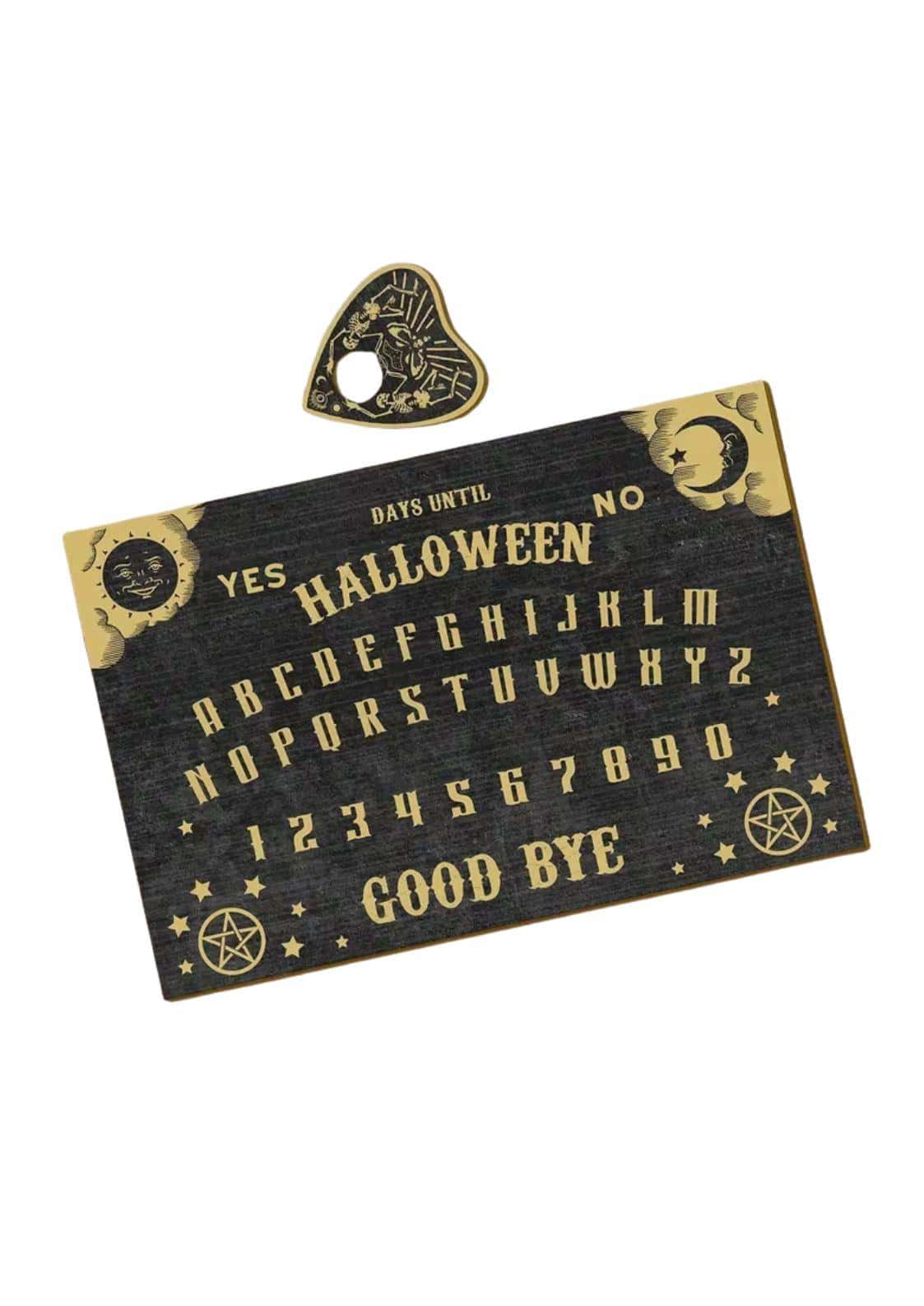 Halloween ouija board aus schwarzem holz mit goldenen lettern und herzförmigem planchette spirit board